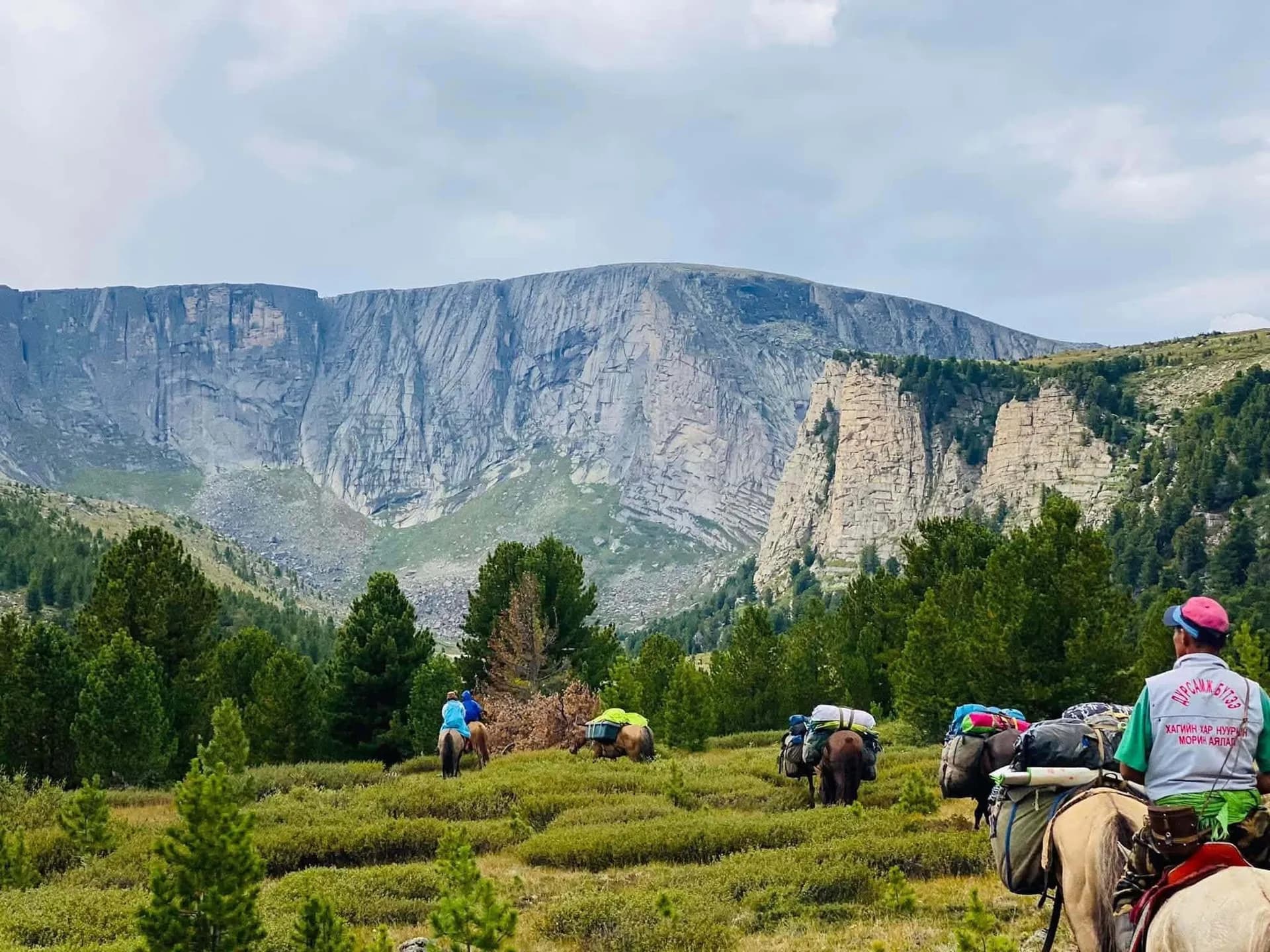 Horseback expedition in Mongolia's mountain landscape